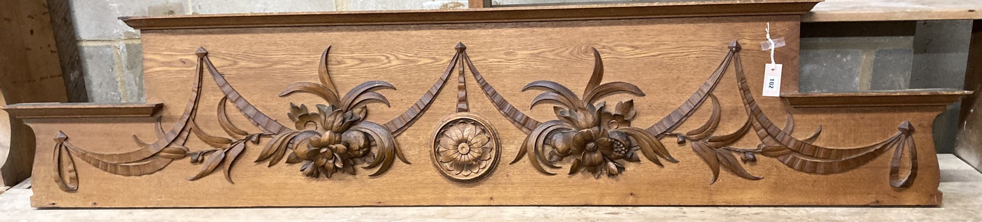 A large Continental carved oak pelmet / cornice, length 216cm, height 46cm